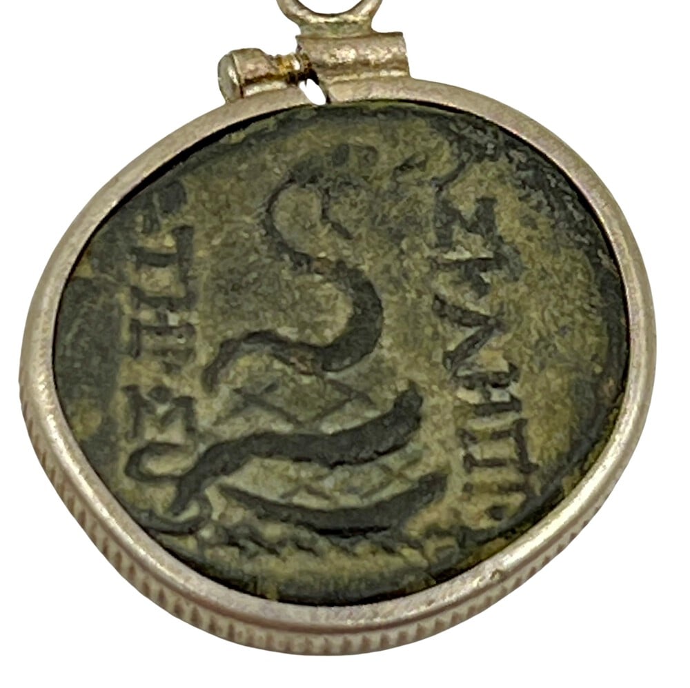 Elephant and Dionysus Greek Coin: Elephant and Dionysus, authentic bronze coin, expertly transformed into a stunning pendant necklace (#370).Genuine ancient bronze coin (circa 148 BCE).Beautifully mounted in a pendant setting, showcas