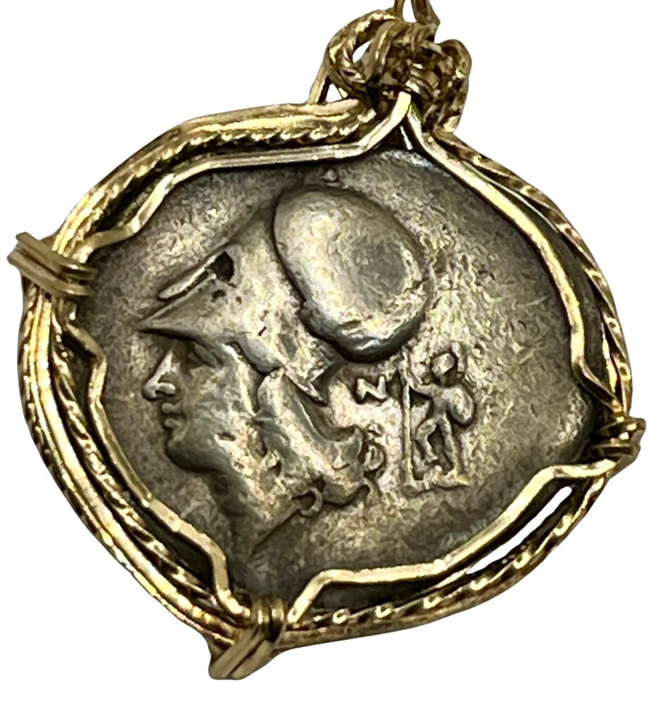 Athena, Nike and Pegasus Coin Pendant: Acquire a fragment of ancient history with this genuine silver coin, featuring Athena, Nike and Pegasus, masterfully converted into an exquisite pendant necklace. A very rare and significant piece of 