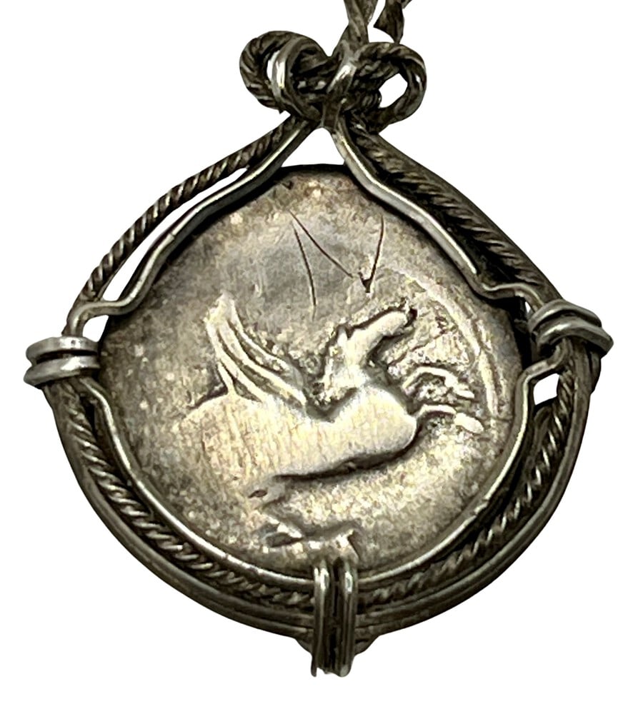 Rare Pegasus and Roman General Sulla Necklace: Roman General Sulla and Pegasus authentic silver coin, expertly transformed into a stunning pendant necklace. (#72)Genuine ancient silver coin (circa 115 BCE)Beautifully mounted in a pendant setting, 
