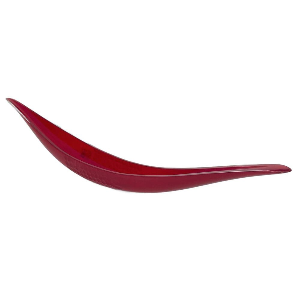 Canoe made by Cenedese of Murano Glass: Created by noted Glass Master Simone Cenedese, this lovely piece is perfect as an accent in any room, Hand-formed, and meticulously sculpted once it is cooled, this piece measures 23.5" long.