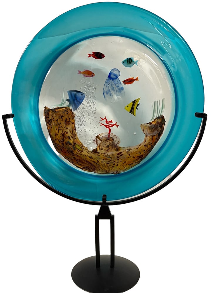Aquarium Disc on Stand from Murano, Italy: Beautiful handmade Murano glass aquarium on pedestal stand, measuring 29 inches tall. Signed by one of the top Glassmaster’s in Murano. A wonderful piece to feature in any home. Created in the furna