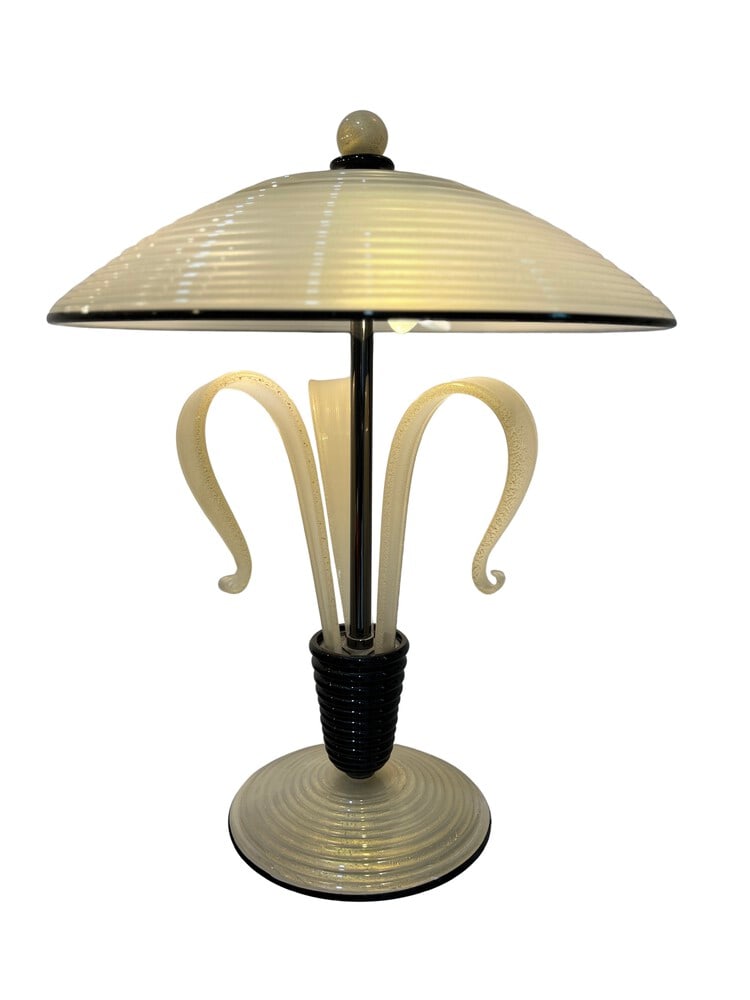 Fabulous Murano Glass Table Lamp by Vivarini: This Murano Glass table lamp is one of the finest we have ever offered. Made in the furnaces of Vivarini Formia in Murano. Each piece is hand-formed using Murano glass with 24K gold powder infused int