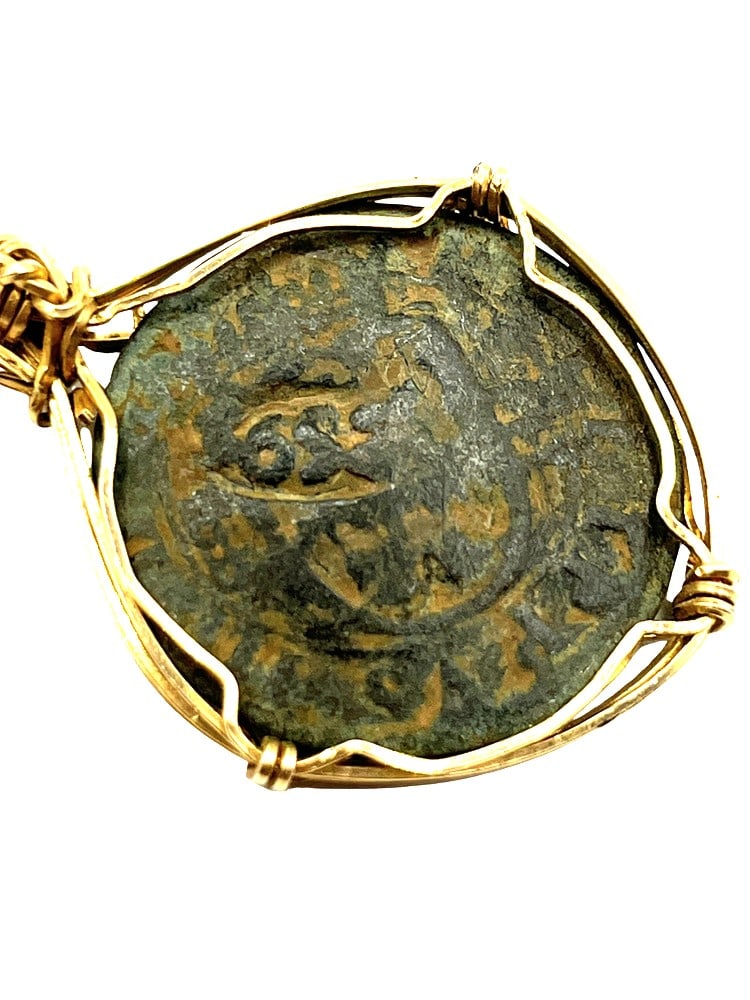 Spanish Shipwreck Coin 8 Reale Dated 1652: Rare Dated Spanish Shipwreck Coin Pendant-A Piece of HistoryOwn a piece of ancient history with this authentic bronze coin, expertly transformed into a stunning pendant. (#420) Features:Genuine ancien