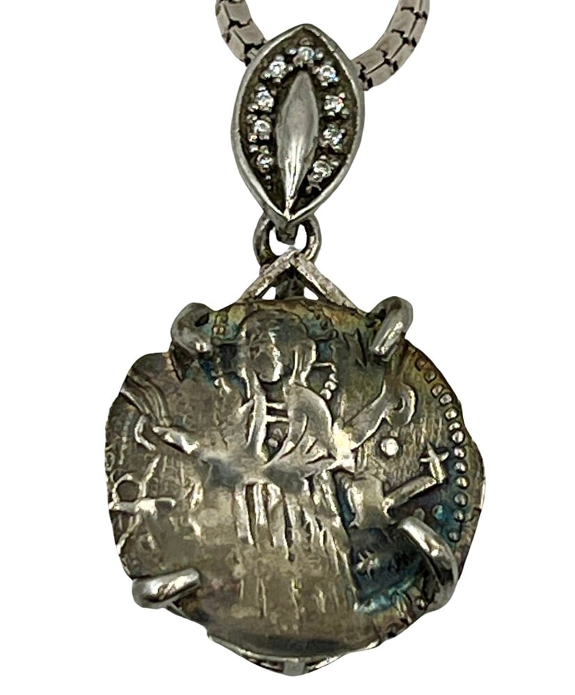 Jesus Resurrection Coin from 1325 AD as a Necklace: Resurrection Coin of Jesus as a Pendant Necklace.Own a piece of ancient history with this authentic silver coin, expertly transformed into a stunning pendant necklace. (#56)Genuine ancient silver coin