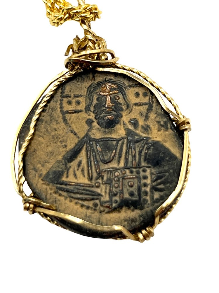 First Coin of Jesus Christ: Acquire a piece of ancient history with this genuine bronze coin, the earliest known to bear the likeness of Jesus Christ and Mary, masterfully converted into an exquisite pendant necklace. (#423).- A