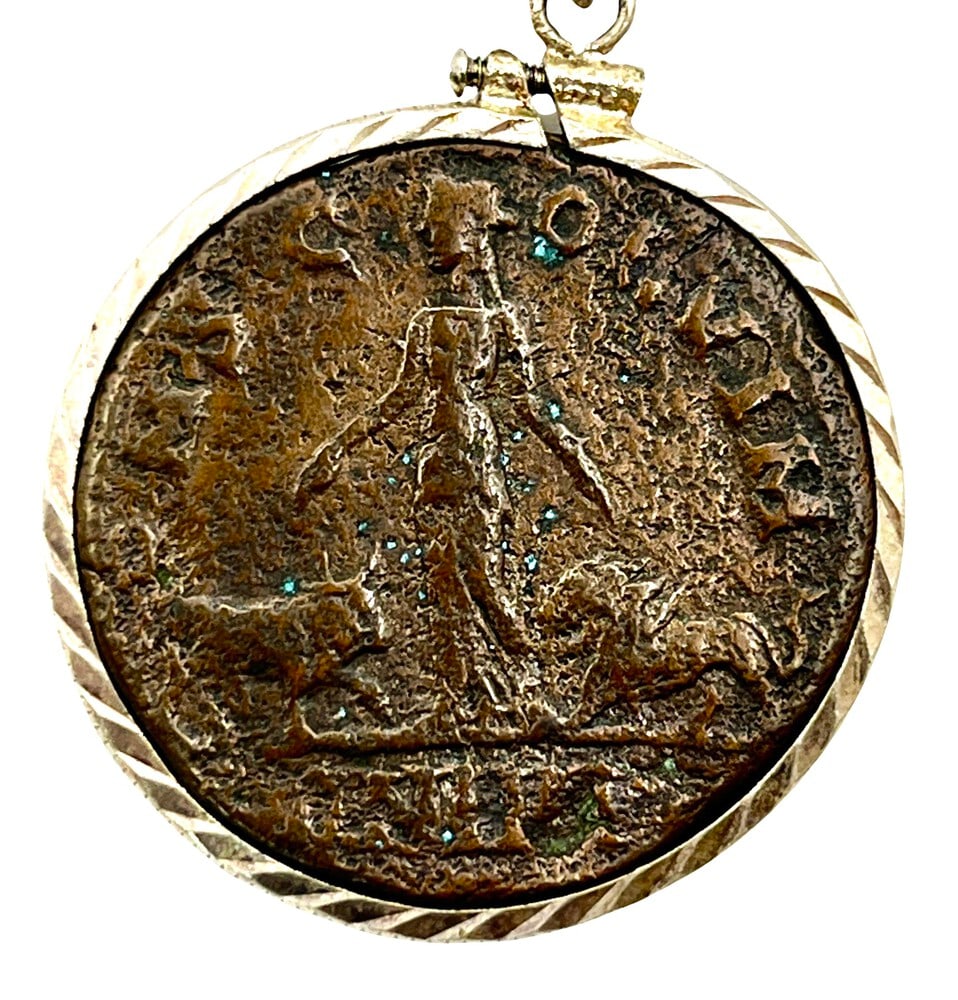 Bull and Lion Roman Coin: Ancient Coin of Emperor Philip Pendant-A Piece of History. Own a piece of ancient history with this authentic bronze coin, expertly transformed into a stunning pendant. (#394). Genuine ancient bronze 