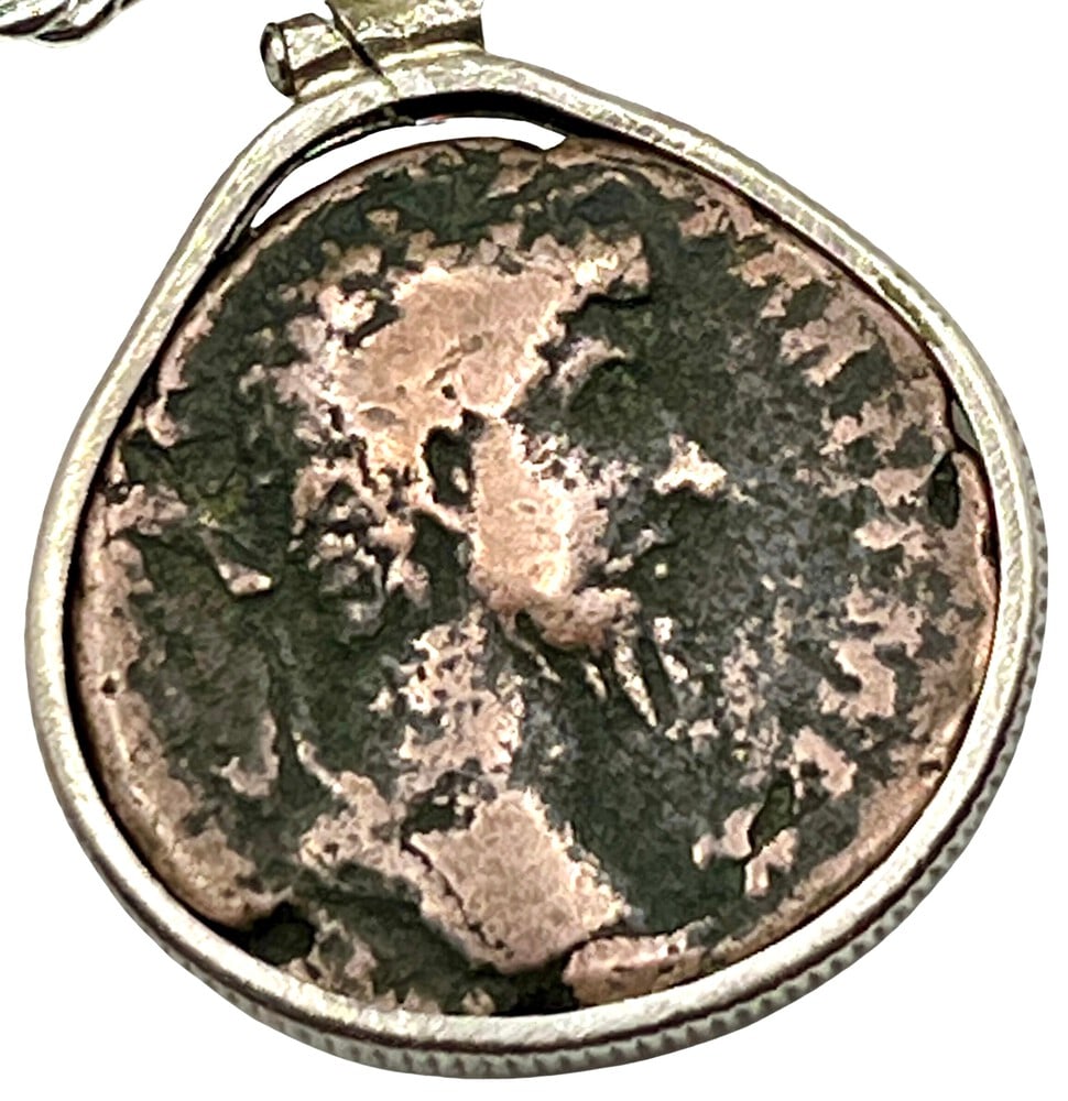 Emperor Marcus Aurelius Ancient Coin: Ancient Coin of Emperor Marcus Aurelius Pendant-A Piece of History. Own a piece of ancient history with this authentic bronze coin, expertly transformed into a stunning pendant. (#111). Genuine ancien