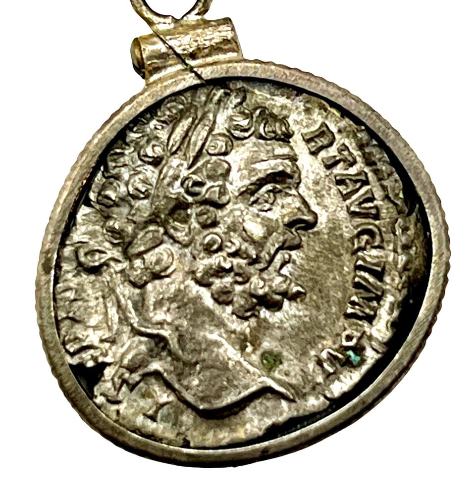 Angel and Emperor Severus Coin: Ancient Emperor Severus Silver Coin Pendant-A Piece of History. Own a piece of ancient history with this authentic silver coin, expertly transformed into a stunning pendant. (#187). Genuine ancient