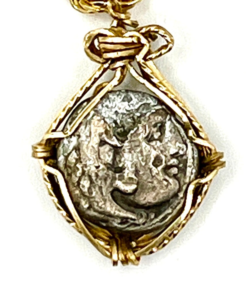 Alexander the Great Ancient Coin: Ancient Silver Alexander the Great Coin Pendant-A Piece of History. Own a piece of ancient history with this authentic silver coin, expertly transformed into a stunning pendant. (#347). Genuine ancien
