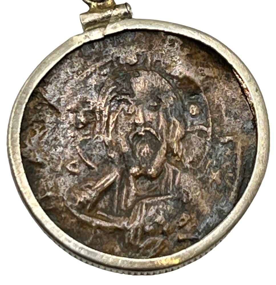 Ancient Coin of Jesus and Christian Cross: Acquire a fragment of ancient history with this genuine bronze coin, the earliest known to bear the likeness of Jesus Christ, masterfully converted into an exquisite pendant necklace. (TBD). - Authent