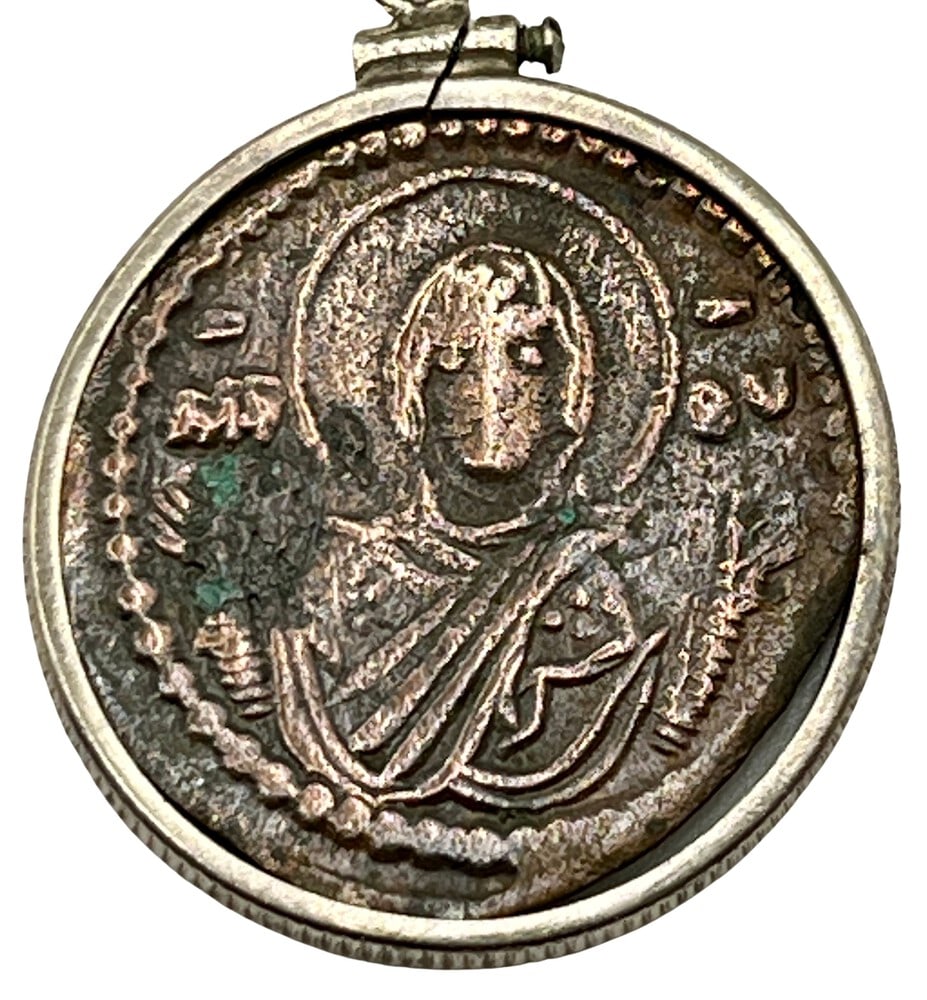 Jesus and Mary 1,000-Year-Old Coin: Acquire a fragment of ancient history with this genuine bronze coin, the earliest known to bear the likeness of Jesus Christ and Mary, masterfully converted into an exquisite pendant necklace. (#73A).