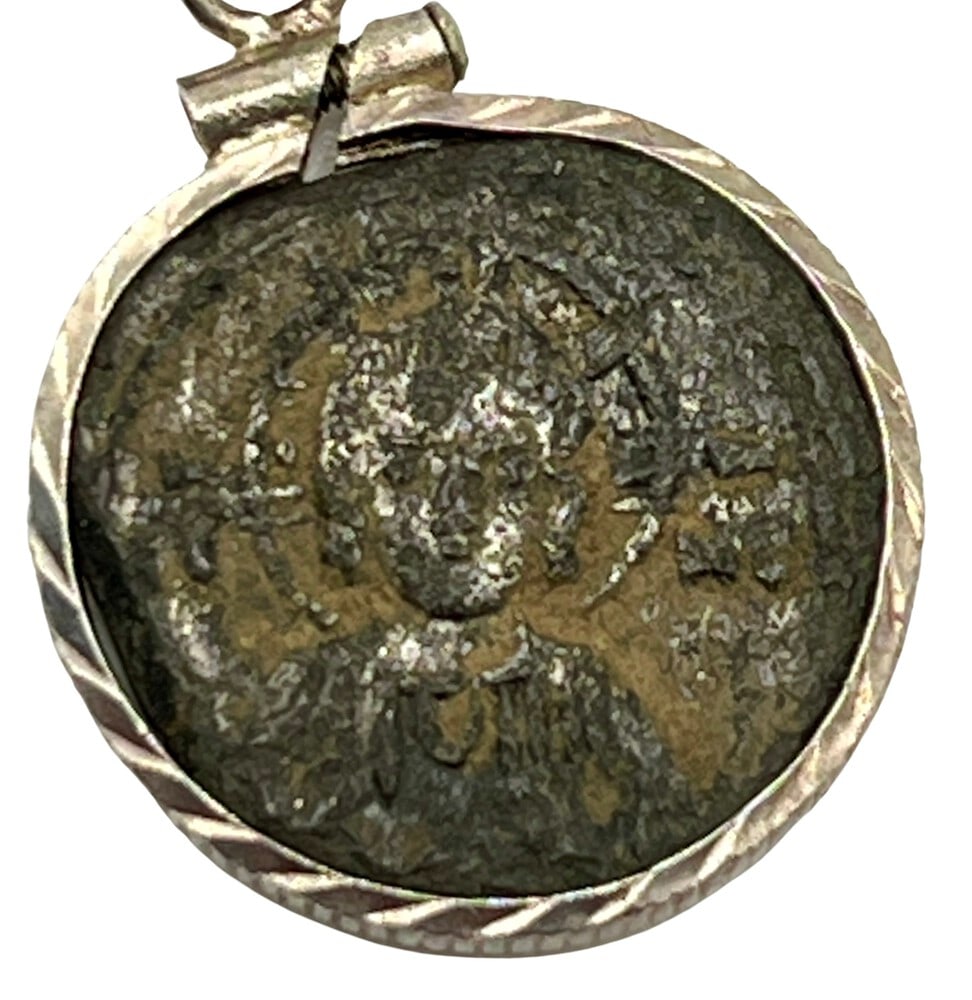 Miniature Jesus Coin from Constantinople: Acquire a fragment of ancient history with this genuine bronze coin, the earliest known to bear the likeness of Jesus Christ, masterfully converted into an exquisite pendant necklace. (#142). - Authen