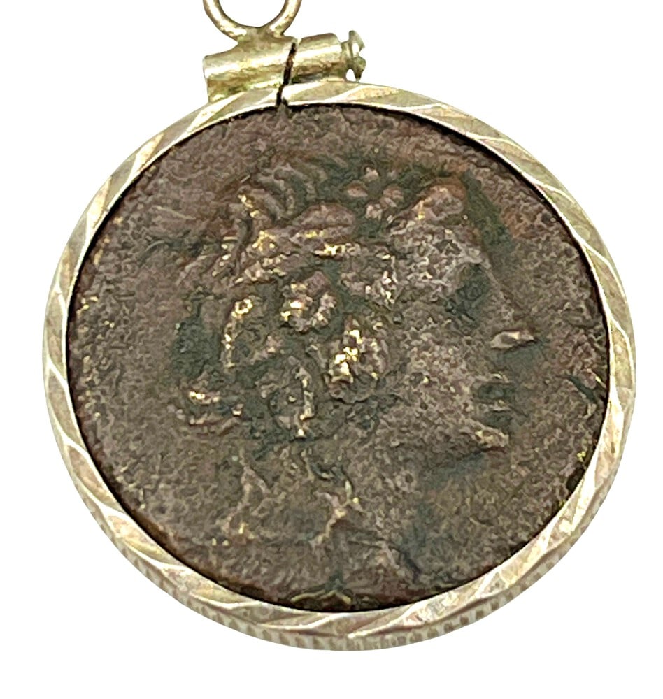 Coin of Dionysus: Dionysus, God of Wine, authentic bronze coin, expertly transformed into a stunning pendant necklace. (#372). Genuine ancient bronze coin (circa 148 BCE). Beautifully mounted in a pendant setting,