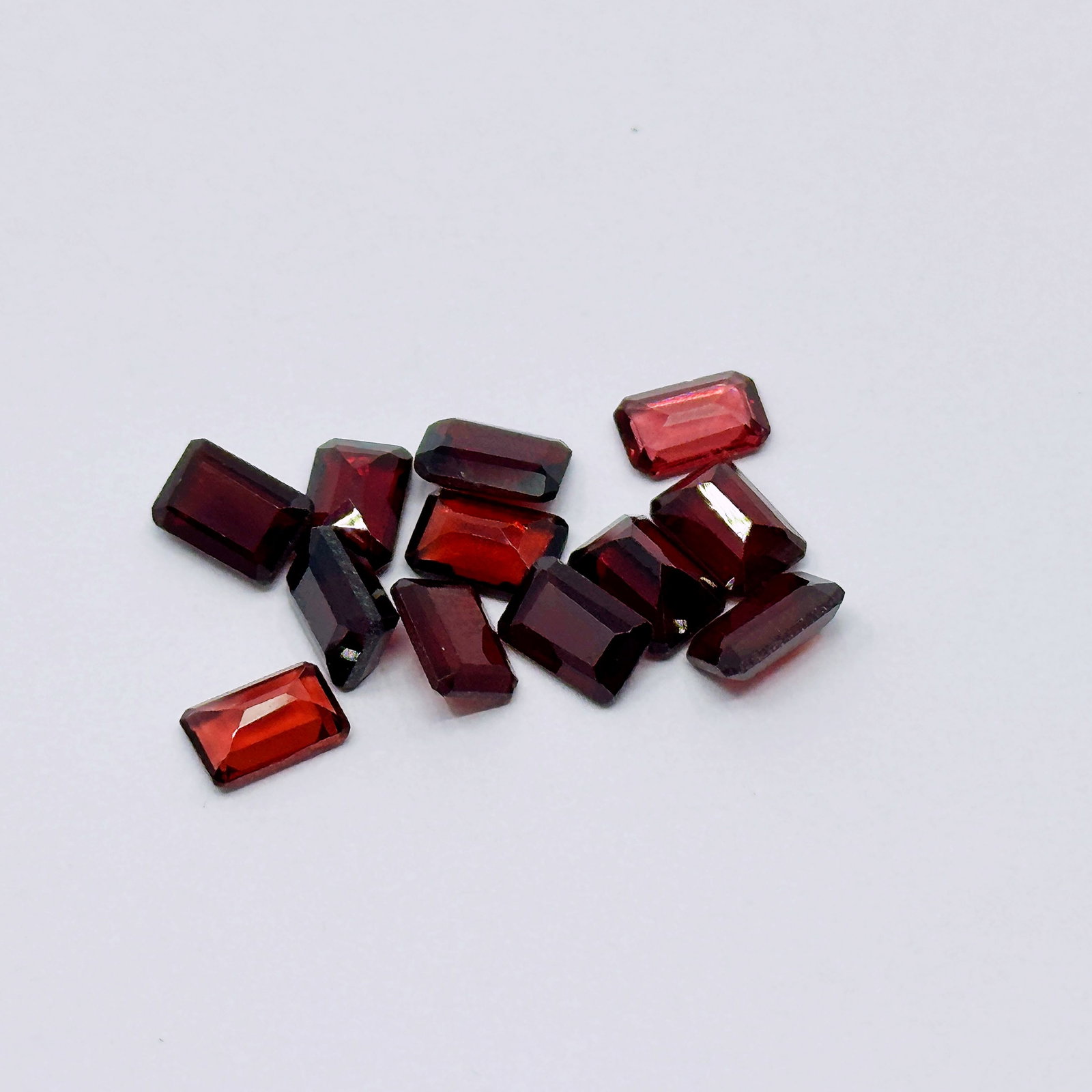 Collection of Natural Red Garnets 8.82 total Ct weight: Emerald Cut, dimensions of each stone: 6x4x2.5 mm