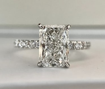 Certified 4 Carat Radiant Cut D VVS1 Lab Grown Diamond Engagement Ring 14KT Solid White Gold: Certified 4 Carat Radiant Cut D VVS1 Lab Grown Diamond Engagement Ring 14KT Solid White Gold - Side Stone is Lab Grown Diamonds VS1 D Color Round Cut 0.60 CT - Excellent Luster- Ring Size US- 6.5 - Ri