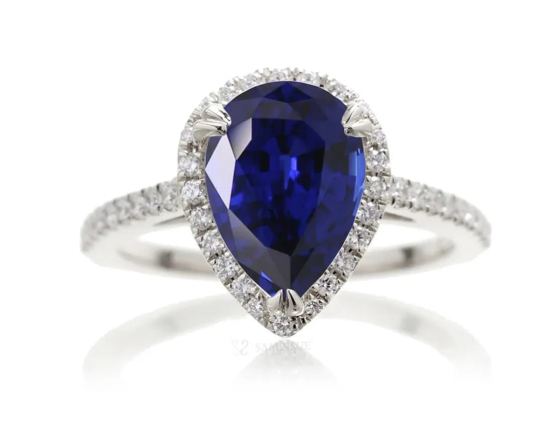 Certified 7 Ct.14kt Solid White Lab Grown sapphire Pear Cut Engagement ring: Certified 7.00 Ct.14kt Solid White Lab Grown sapphire Oval Cut Engagement ring - Side Stone is lab grown Diamonds vs1 e color Round cut 0.40 Ct Ring Size US 6