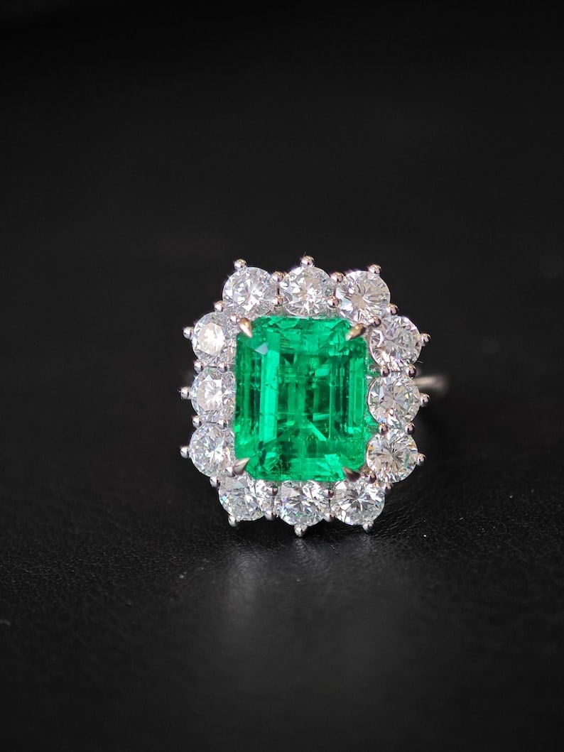 Certified 7.5 Ct - 14kt Solid White Lab Grown Green Emerald Engagement ring: Certified 7.5 Ct - 14kt Solid White Lab Grown Green Emerald Engagement ring -Ring Size US 6 - Side stone Lab Grown Diamonds Round VS1 E Color 0.70 Ct
