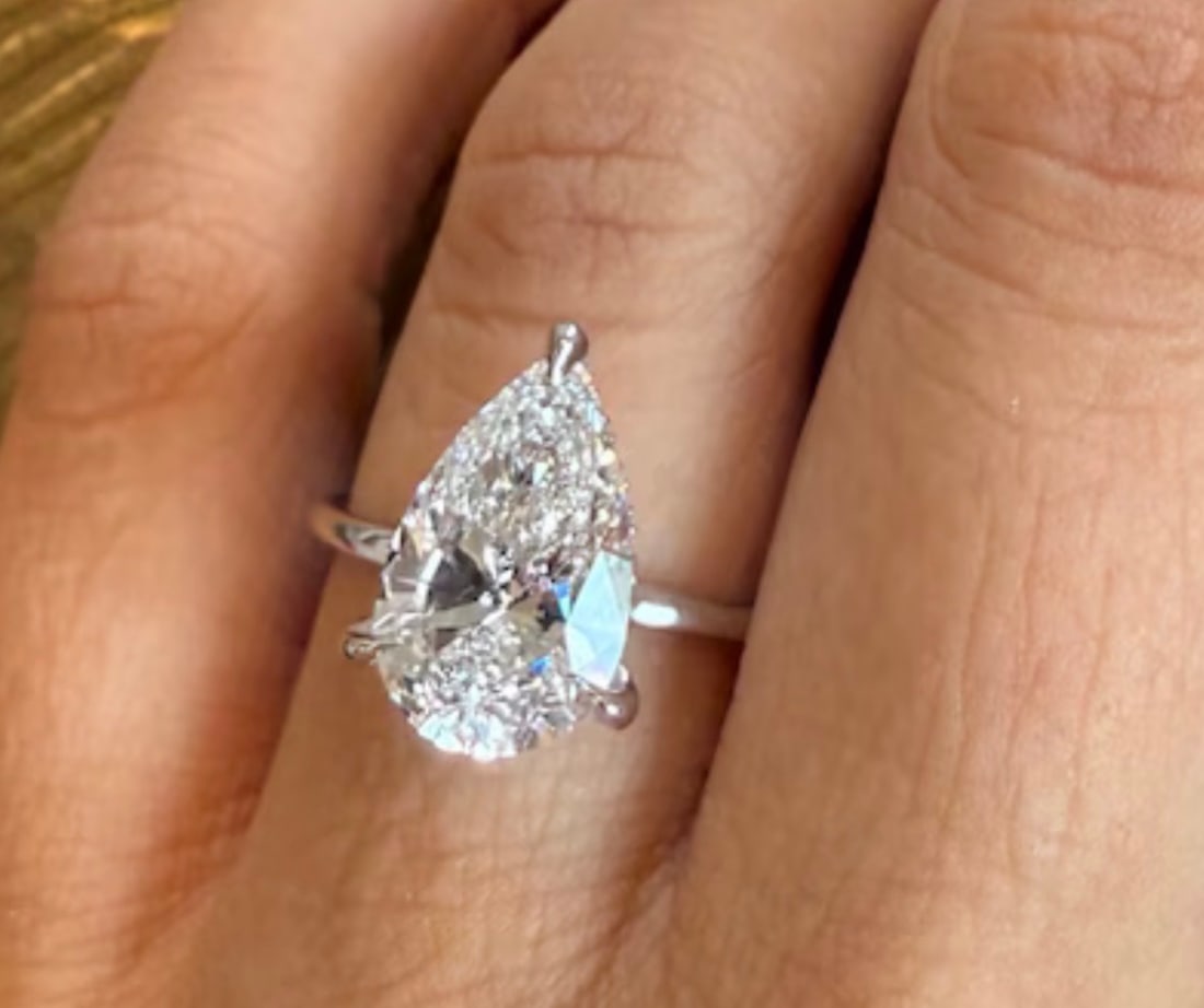 Certified 5.5 Carat Pear Cut D VVS1 Lab Grown Diamond Ring 14KT Solid White Gold: Certified 5.5 Carat Pear Cut D VVS1 Lab Grown Diamond Ring 14KT Solid White Gold Side Diamonds vs1 - e color round cut 0.30 ct - Ring Size US - 8