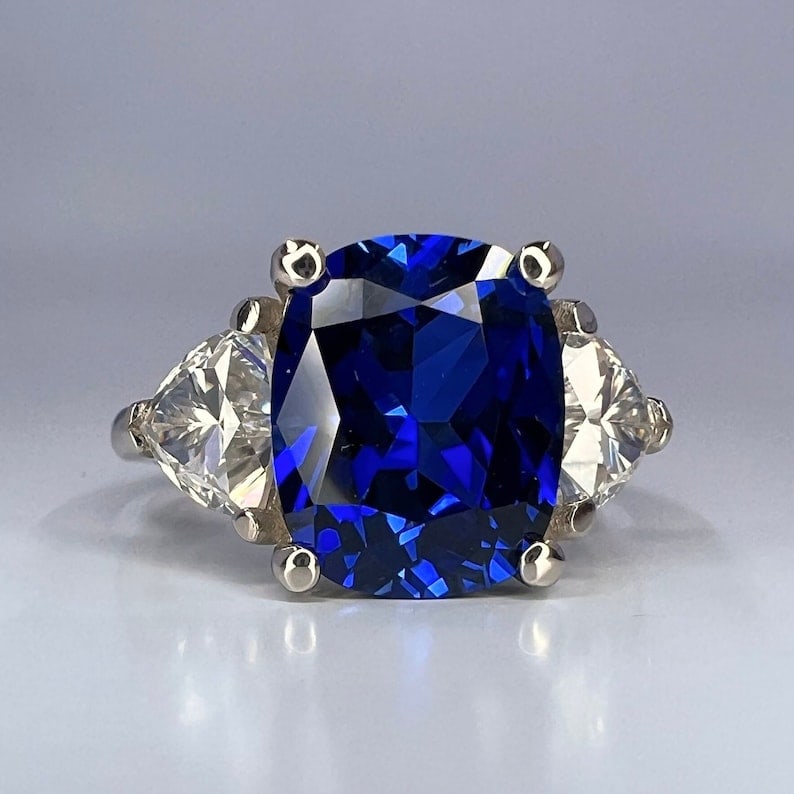 Certified 10.5 Carat cushion cut Lab Grown Blue Sapphire Engagement Ring 14KT Solid White Gold: Certified 10.5 Carat cushion cut Lab Grown Blue Sapphire Engagement Ring 14KT Solid White Gold - Ring Size US - 6 Side stone 0.90 Ct Lab Grown Diamonds Fancy VS1 E
