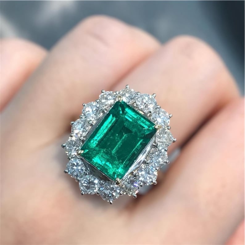 Certified 15 Carat Emerald Cut Lab Grown Green Emerald Engagement Ring 14KT Solid White Gold: Certified 15 Carat Emerald Lab Grown Green Emerald Engagement Ring 14KT Solid White Gold - Ring Size US 7 -Side stone 1.40 Ct Lab Grown Diamonds Round Cut