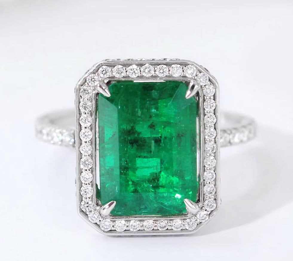 Certified 10 Carat Emerald Cut Lab Grown Green Emerald Engagement Ring 14KT Solid White Gold: Certified 10 Carat Emerald Cut Lab Grown Green Emerald Engagement Ring 14KT Solid White Gold - Ring Size US 6.5 Side stone 0.60 Ct Lab Grown Diamonds Round Cut