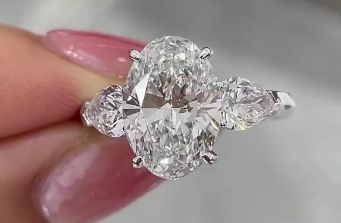 Certified 6.5 Oval Cut Lab Grown Diamond D VVS1 Engagement Ring 14KT Solid White Gold: Certified 6.5 Ct Oval Cut Lab Grown Diamond D VVS1 Engagement Ring 14KT Solid White Gold - Ring Szie US 7 - Side stone 1.20 Ct Lab Grown Diamonds D vs1 - Fancy Cut