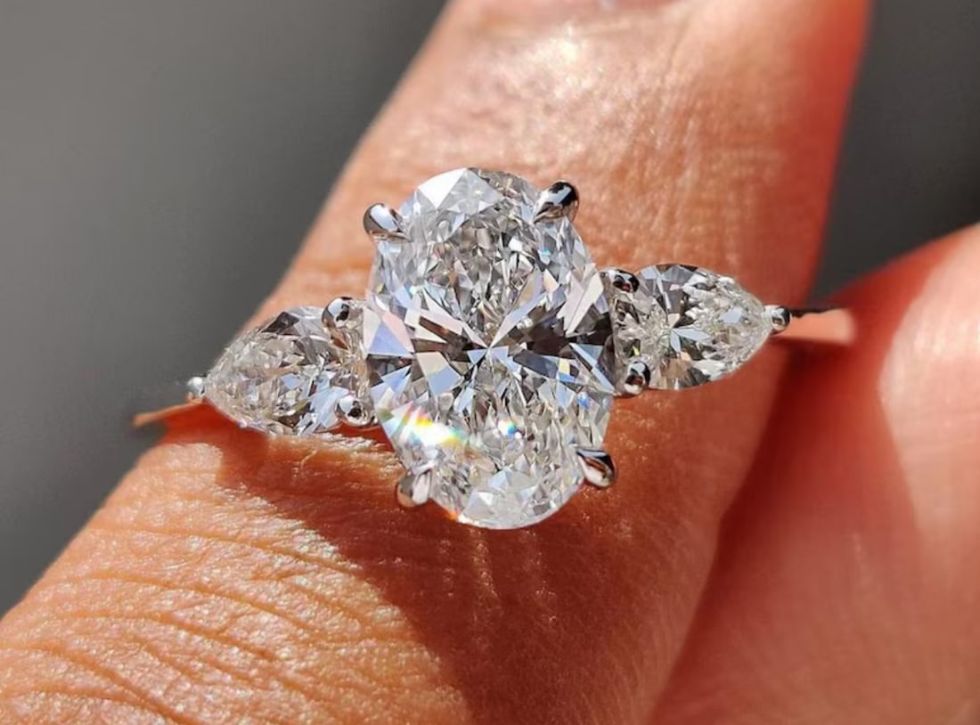 Certified 2.5 Oval Cut Lab Grown Diamond D VVS1 Engagement Ring 14KT Solid White Gold: Certified 2.5 Oval Cut Lab Grown Diamond D VVS1 Engagement Ring 14KT Solid White Gold - Ring Szie US 7 - Side stone 0.60 Ct Lab Grown Diamonds D vs1 - Pear Cut