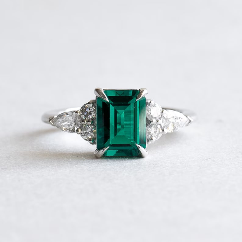 Certified 4 Carat Emerald Cut D VVS1 Lab Grown Green Emerald Ring 14KT Solid White Gold: Certified 4 Carat Emerald Cut Lab Grown Green Emerald Ring 14KT Solid White Gold - Side Stone is Lab Grown Diamonds 0.50 Ct VS1 - E Color - Ring Size US 6