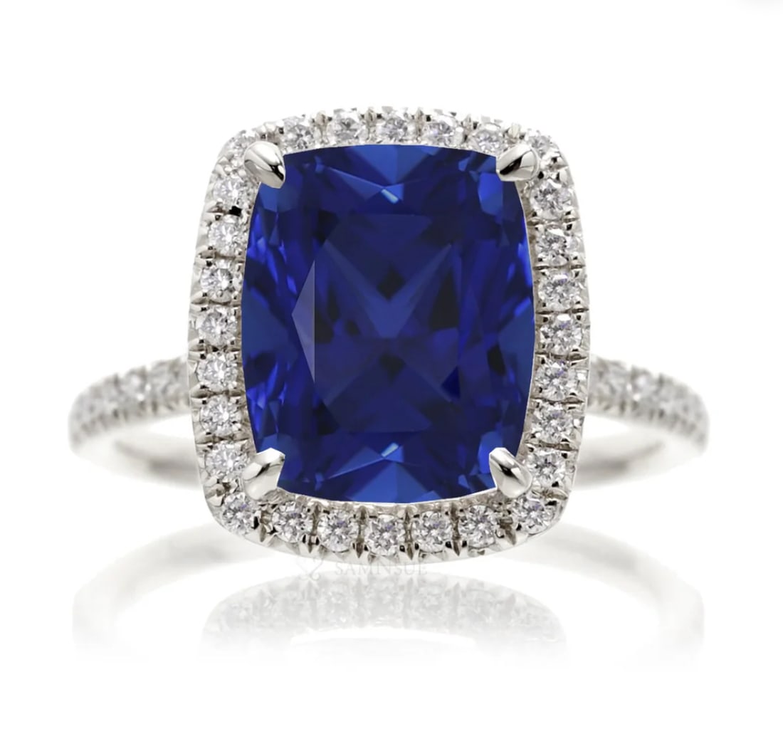 Certified 12 Carat long cushion cut Lab Grown Blue Sapphire Engagement Ring 14KT Solid White Gold: Certified 12 Carat long cushion cut Lab Grown Blue Sapphire Engagement Ring 14KT Solid White Gold - Ring Size US -7 Side stone 0.60 Ct Lab Grown Diamonds Round VS1 E Color