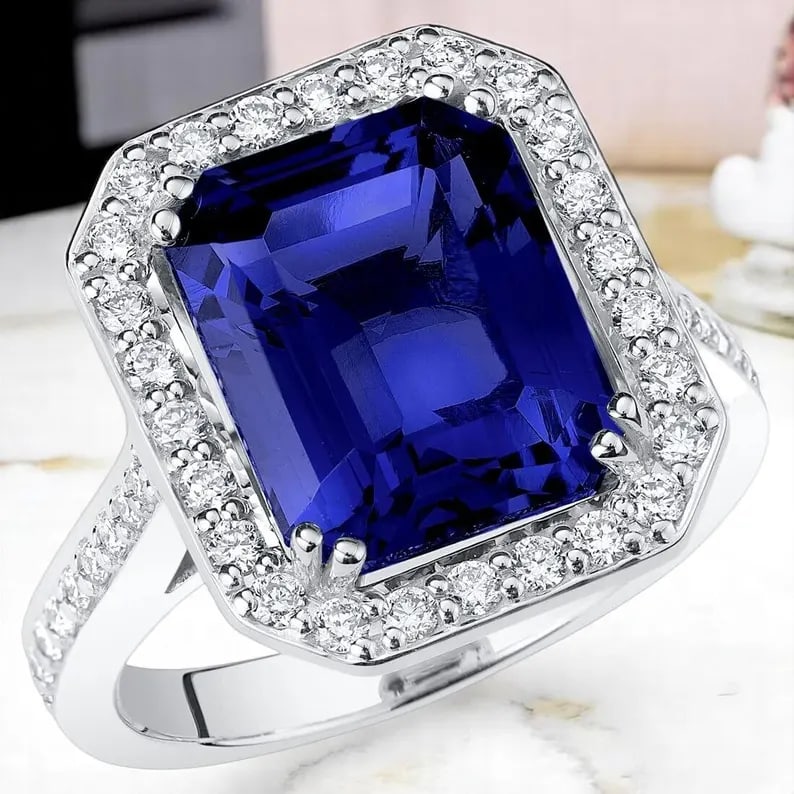 Certified 12.5 Carat Emerald cut Lab Grown Blue Sapphire Engagement Ring 14KT Solid White Gold: Certified 12.5 Carat Emerald cut Lab Grown Blue Sapphire Engagement Ring 14KT Solid White Gold - Ring Size US -6.5 Side stone 0.40 Ct Lab Grown Diamonds Round VS1 E Color