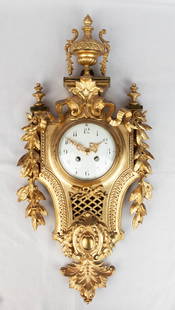 Mid-19th Century Gilt-bronze wall clock in Louis XVI style, Napoleon III period, with laurel leaf: 30x66cm