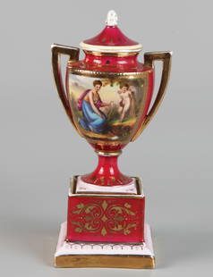 Vienna, Austria Porcelain vase with double handles and tall foot, in Louis XVI style with heavy: H:16cm