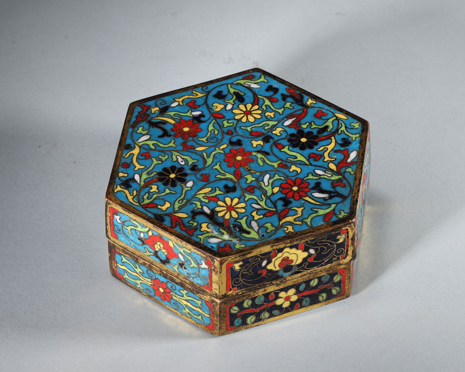 An interlocking flower patterned hexagonal cloisonne box (1 of 8)