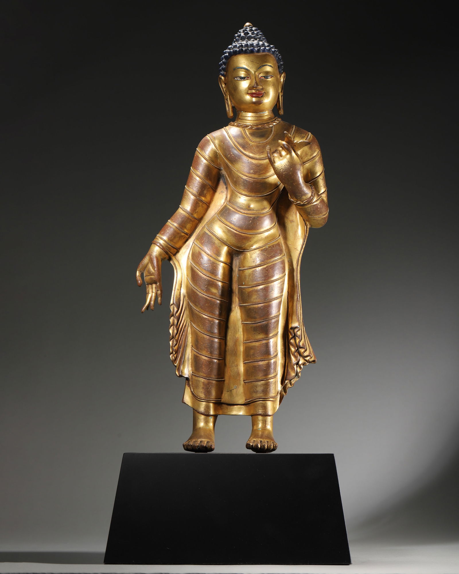 A Gilt-Bronze Standing Figure of Buddha Shakyamuni, Nepalese Style, 13th Century (1 of 10)