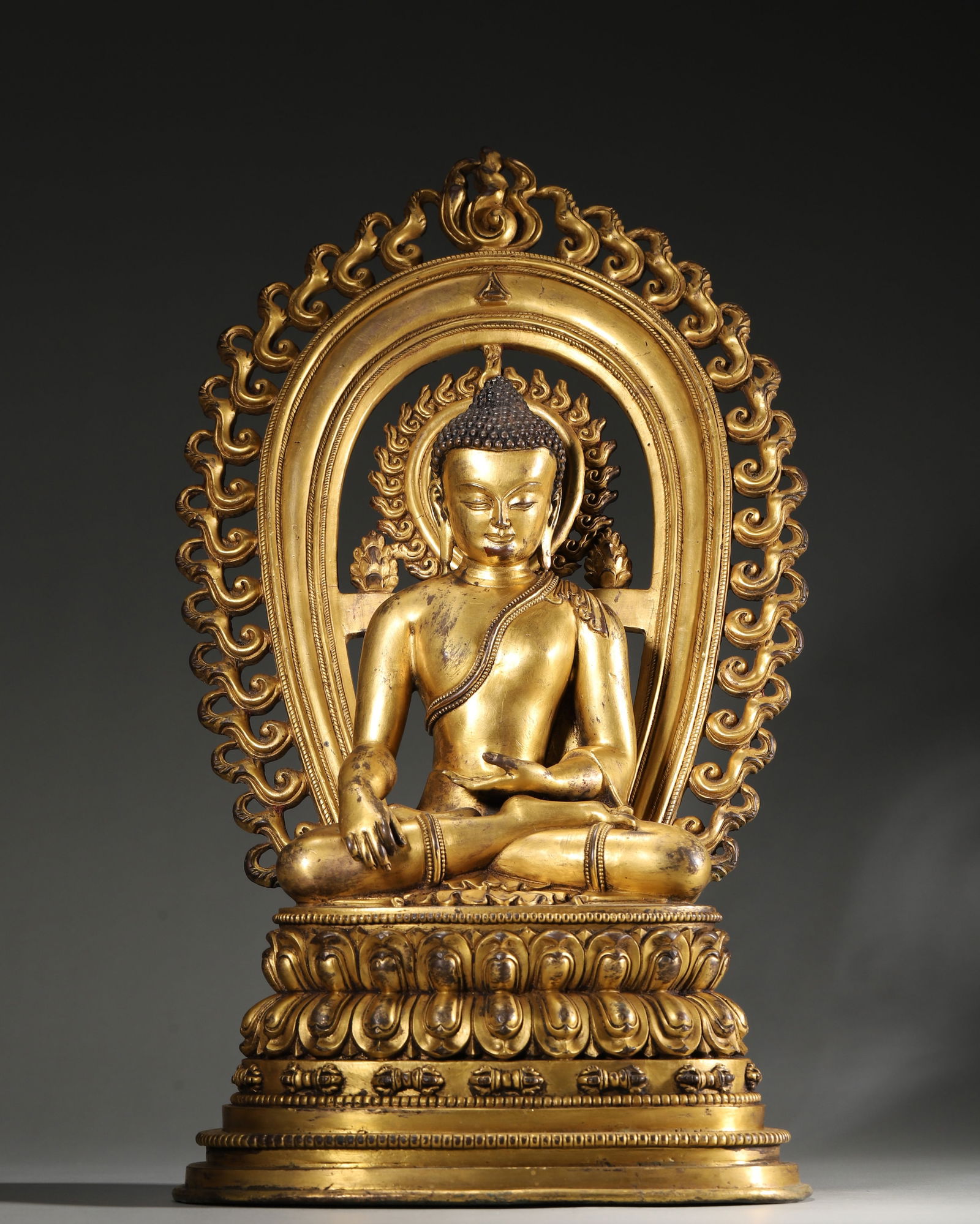 A Gilt-Bronze Seated Figure of Buddha Shakyamuni, Tibetan Style, 15th Century (1 of 10)