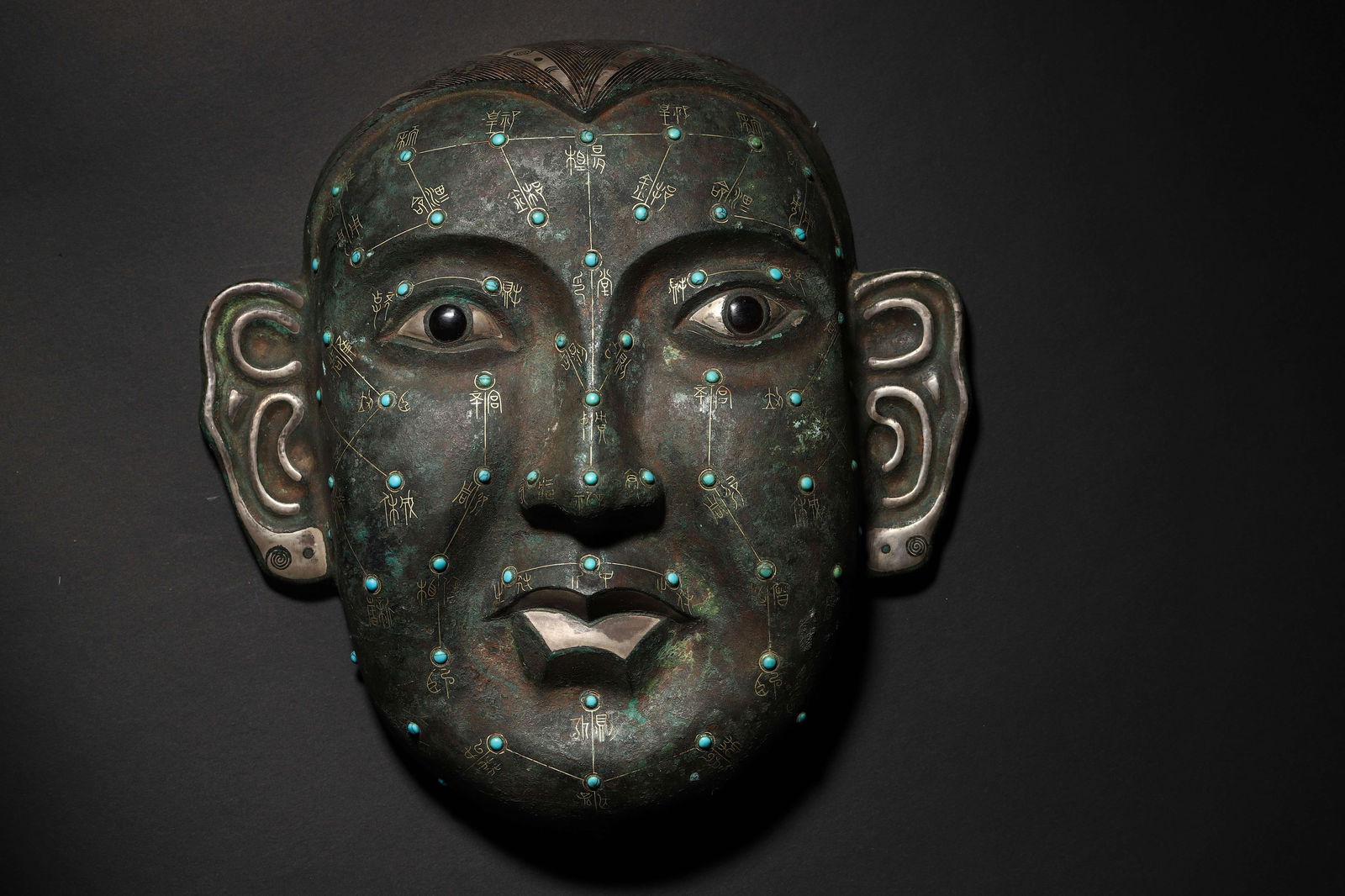 Han Dynasty Gold-and-Silver-Inlaid Turquoise Acupuncture Bronze Human Face Model (1 of 6)