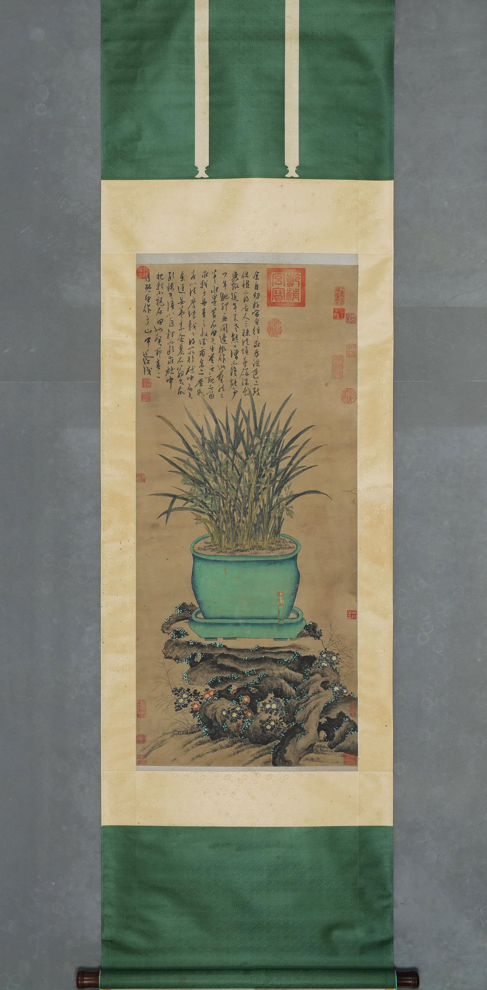 Ming Dynasty, Chen Chun, Orchids and Bamboo by a Rock (Hanging Scroll): Painting Size 106x48cm (42x19in)This colored orchid-basin-rock work has elegant, brushwork, merging Wu School’s freehand charm with meticulous coloring. Accompanied by the artist’s poem