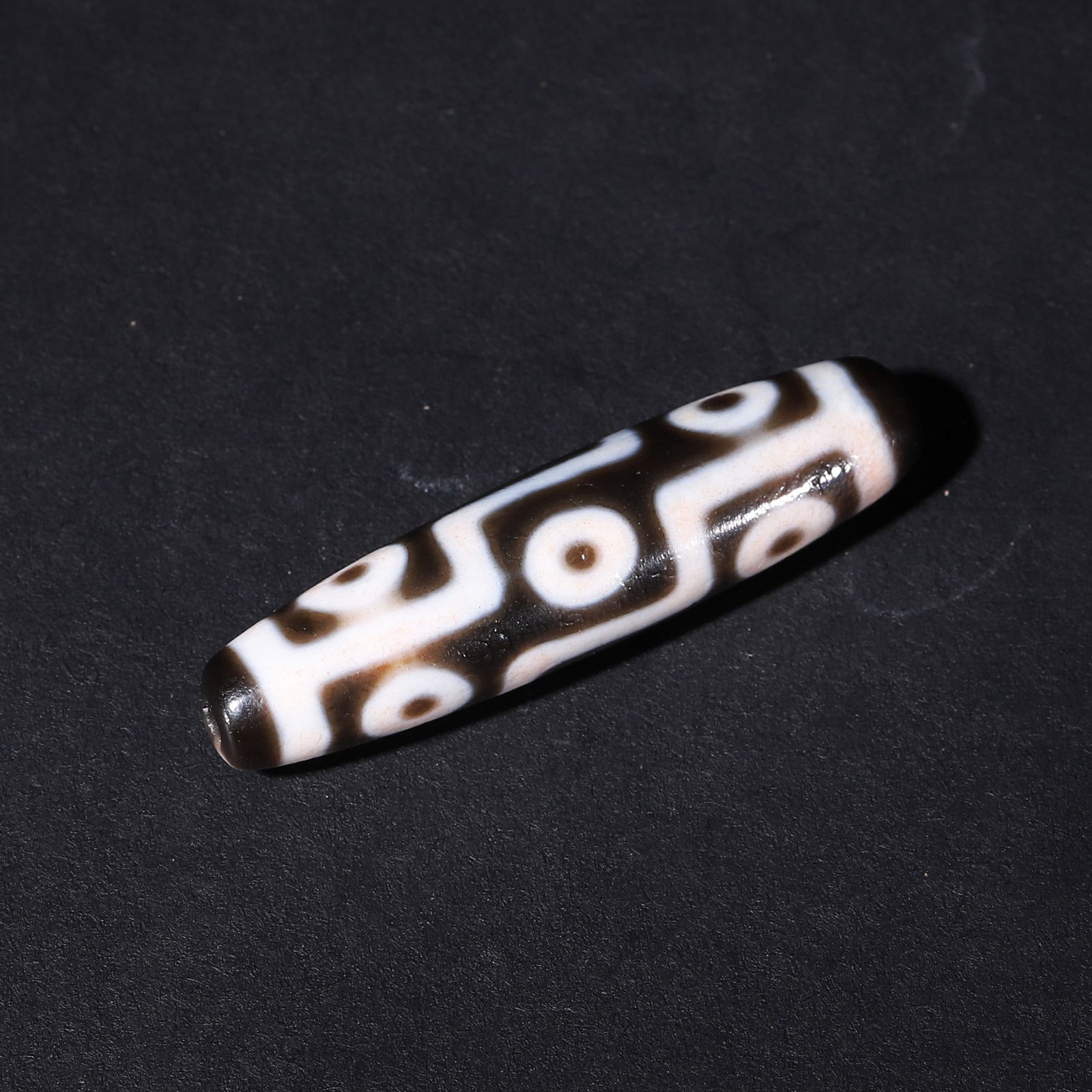 Tang Dynasty, Agate Nine-Eye Old Dzi Bead with Cinnabar Speckles (1 of 10)