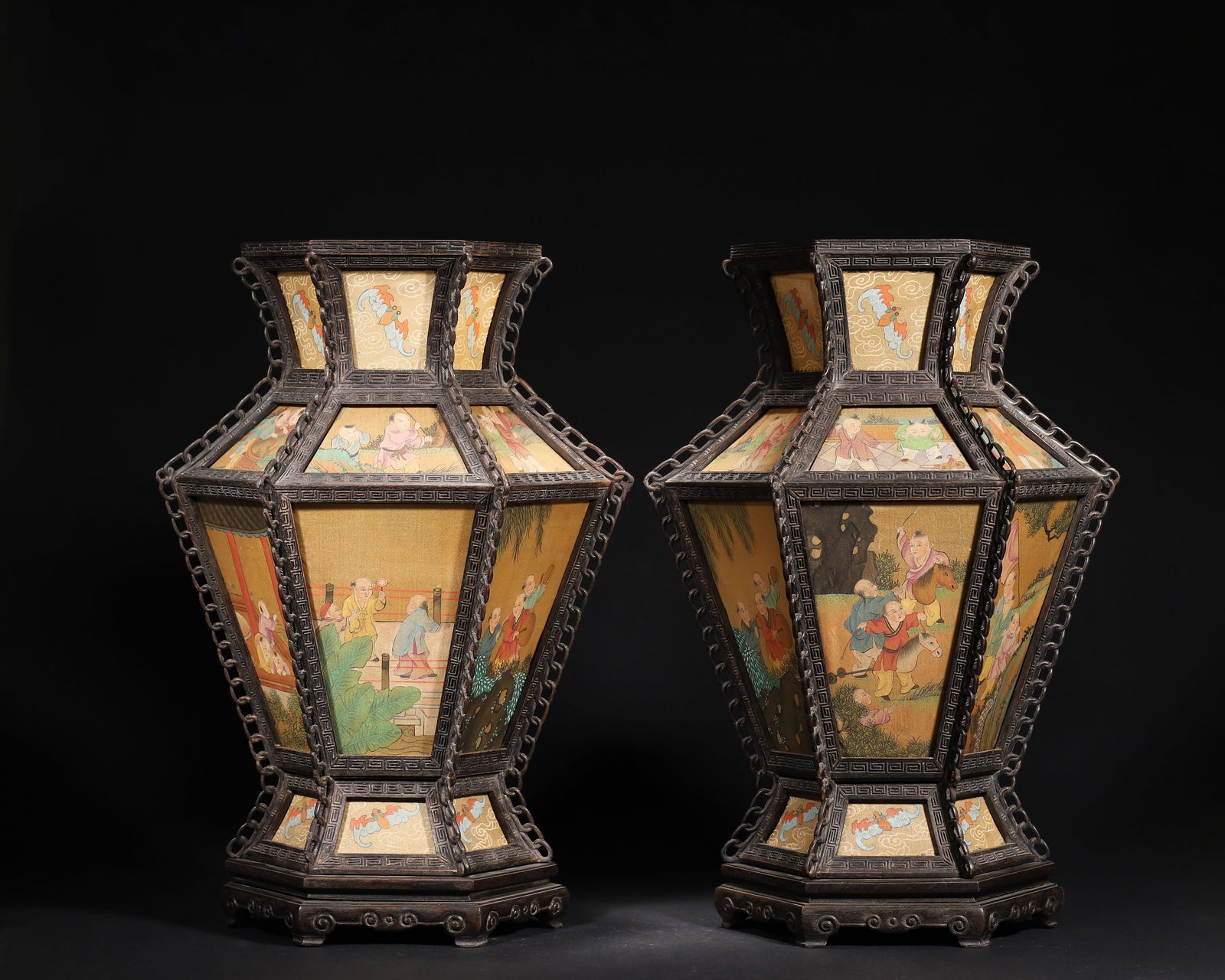 A Pair of Zitanwood Palace Lanterns with Painted Silk Panels, Qianlong Period, Qing Dynasty: Length (L): 32.0cm (12.6in); Width (W): 25.0cm (9.84in); Height (H): 40.0cm (15.75in); Weight (Wt): 2712.0g (5.98lb)This pair of imperial palace lanterns, made during the Qianlong period, features zit