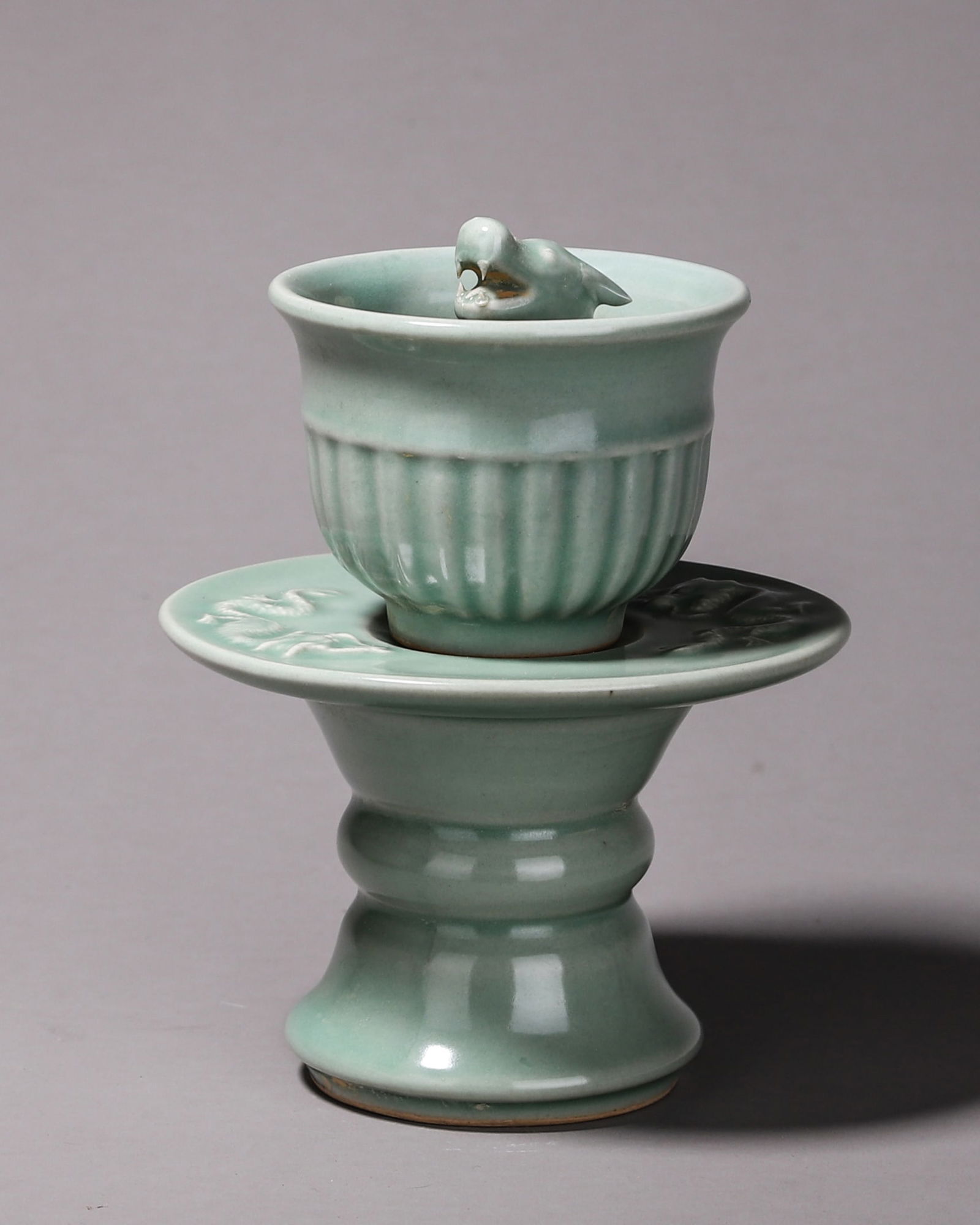 A Longquan kiln porcelain dragon head tea saucer,Song Dynasty: W:12cm H:16cm