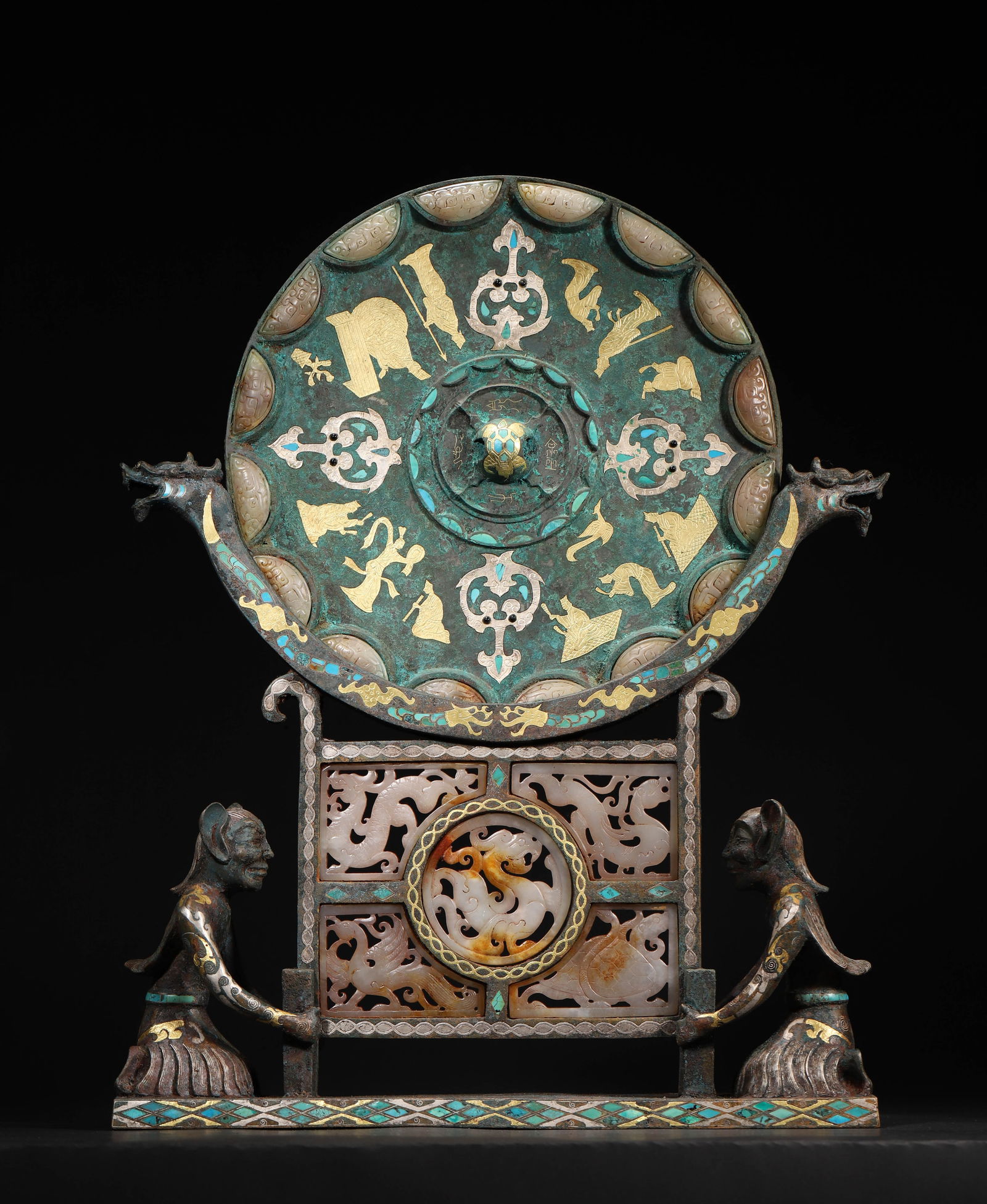 Han Dynasty Gilt-Bronze Mirror Stand with Jade Inlay (Including Mirror): Length (L): 36.0cm (14.17in); Width (W): 8.0cm (3.15in); Height (H): 45.0cm (17.72in); Weight (Wt): 5897.0g (13.0lb)A rare Han imperial gilt-bronze mirror stand: exquisite gold-silver/jade inlay,