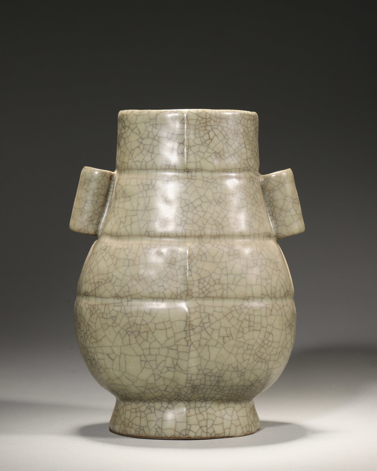 Song Dynasty Ge Kiln Celadon Crackle Vase with Loop Handles: Width (W): 13.0cm (5.12in); Height (H): 20.0cm (7.87in)A rare Song Ge Kiln vase: warm celadon glaze with "golden thread & iron wire" crackle, bronze-ritual-inspired loop-handle shape. A peak Song