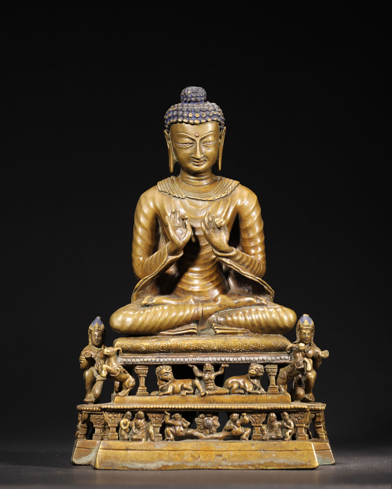 12th-13th Century, Nepal Malla Dynasty, Copper Inlaid Lapis Lazuli Seated Shakyamuni Buddha: Length (L): 20.0cm (7.87in); Width (W): 10.0cm (3.94in); Height (H): 29.0cm (11.42in); Weight (Wt): 4.0kg (4000.0g) (8.82lb)An early masterpiece of the Nepal Malla Dynasty, this figure is made of