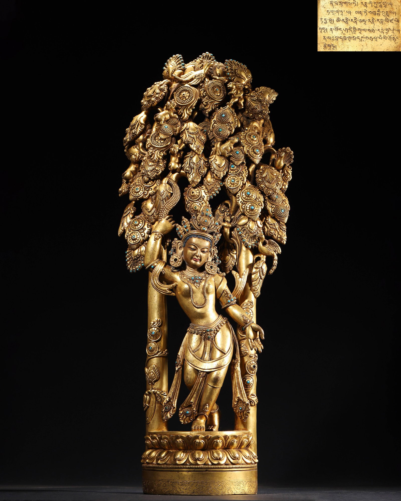 GILT-BRONZE FIGURE OF DANCING AVALOKITESHVARA WITH TURQUOISE INLAY, EARLY QING DYNASTY: 8.27" x 20.87" inches (21.0 cm x 53.0 cm) (Main) | Weight: 14.55 lbs (6600.0 g)An exceptional imperial gilt-bronze figure of Dancing Avalokiteshvara from the Early Qing Dynasty, richly gilded with inl