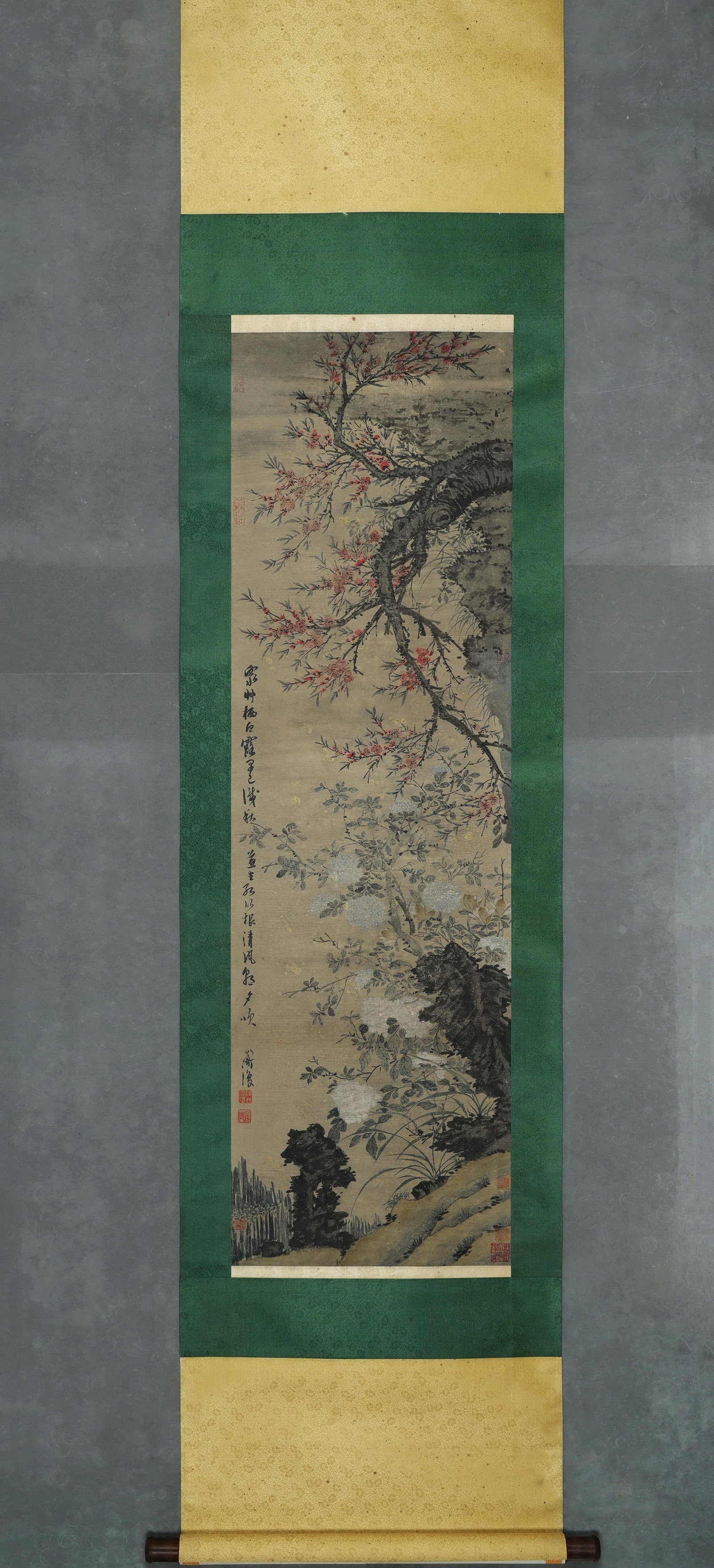 MING DYNASTY: CHEN CHUN - 'BLOSSOMING FLOWERS' - HANGING SCROLL, PAPER: Heart Size: 53.94" x 16.54" inches (137 cm x 42 cm)Ming Dynasty, Chen Chun, A Profusion of Flowers, ink and color on silk, hanging scroll. Painted with peach blossoms and hydrangeas, delicate brushwor