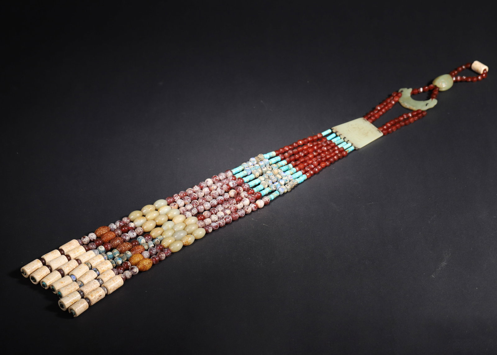 WARRING STATES TO HAN DYNASTY MULTI-GEMSTONE JADE PENDANT SET: Length (l): 35.0Cm (13.78In); Weight (wt): 49.0G (0.11Lb)An aristocratic ritual artifact from the warring states to han dynasty, crafted from jade, agate, turquoise, and eye-bead glass. Exquisite in