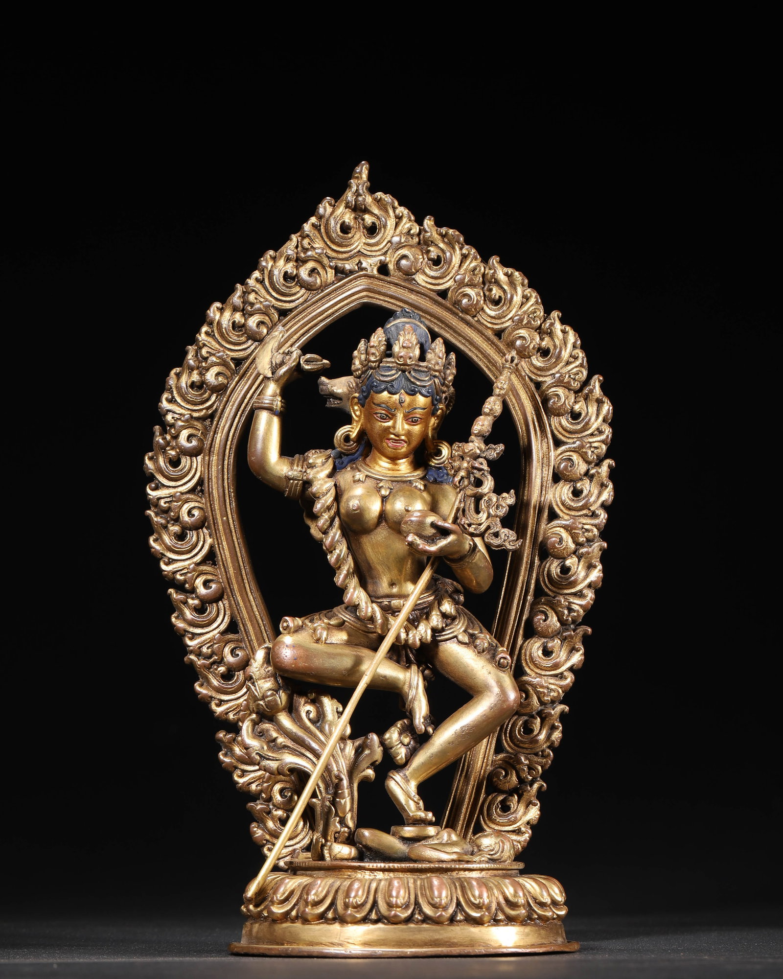GILT-BRONZE STANDING MARICI, QIANLONG PERIOD, QING DYNASTY: 5.51" x 2.99" x 9.06" inches (14.0 cm x 7.59 cm x 23.0 cm) (Main) | Weight: 2.33 lbs (1055.0 g)An gilt-bronze statue of Marici from the Qianlong period, featuring a boar-headed form and dynamic postur