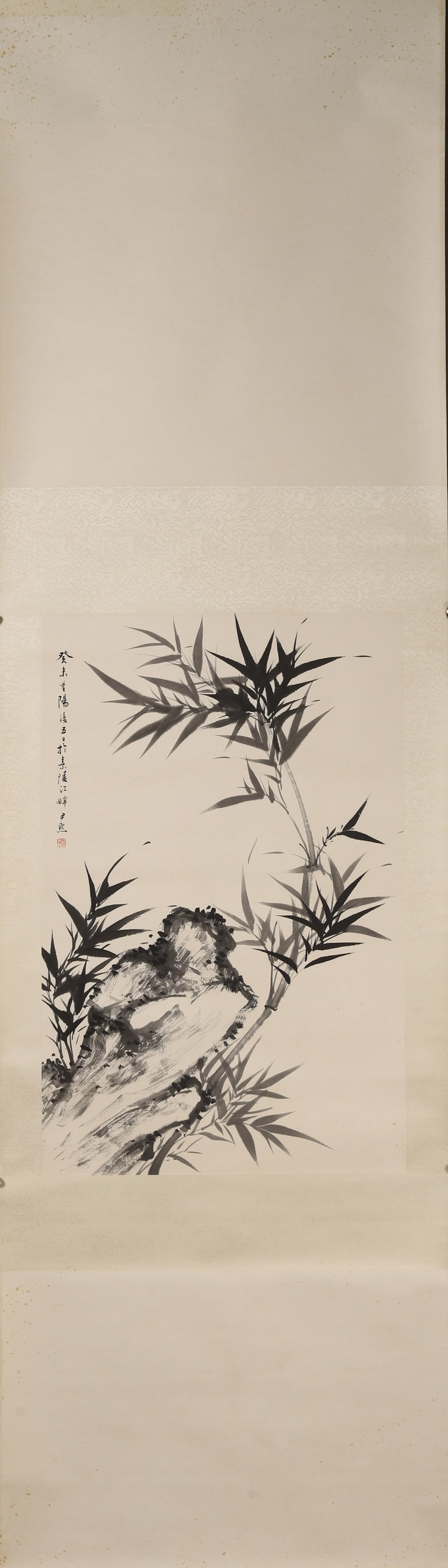 SHEN YINMO, INK BAMBOO AND ROCK, 1943, HANGING SCROLL: Paper Texture, 27.17 inches x 17.72 inches (69.0 cm x 45.0 cm)Painted with masterful calligraphic brushwork, this work features vigorous bamboo and rocks in varying ink tones. A prime example of his i