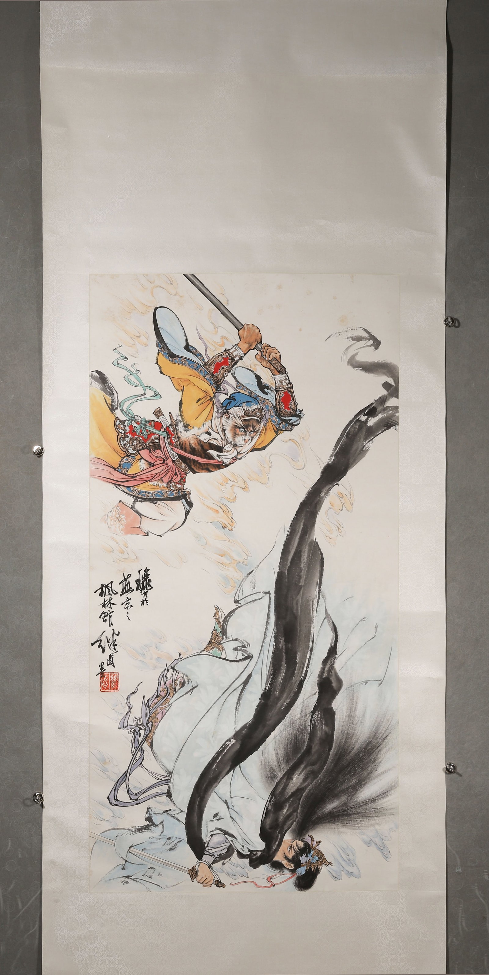 "SUN WUKONG VS. BAIGUJING" HANGING SCROLL BY LIU JIYOU, MODERN CHINESE PERIOD: Paper Texture, Painting Core: 54.33" x 27.17" (138.0cm x 69.0cm)A masterpiece of figure painting by Liu Jiyou, this work combines meticulous color painting with freehand brushwork. The vivid and expre