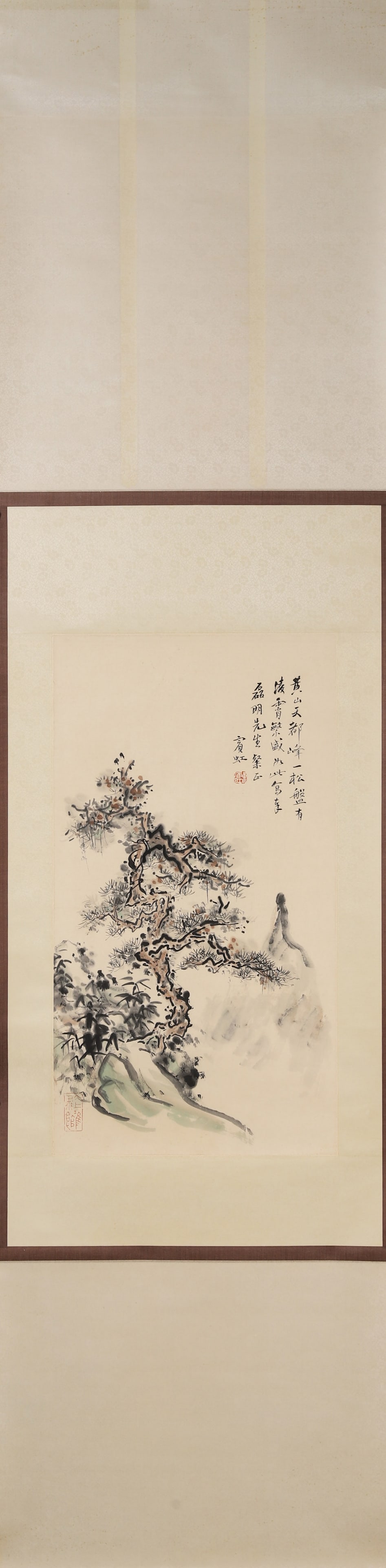HUANG BINHONG, PINE AT HEAVENLY CAPITAL PEAK OF HUANGSHAN, MODERN PERIOD, HANGING SCROLL: Paper Texture, 26.38 inches x 14.17 inches (67.0 cm x 36.0 cm)Executed with bold ink pine and delicate color washes, this work captures Huangshan’s grandeur, exemplifying Huang’s "profound and nou